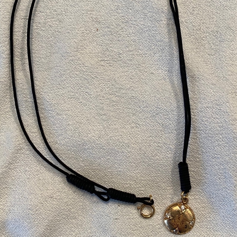 Gold pendant necklace with diamonds
